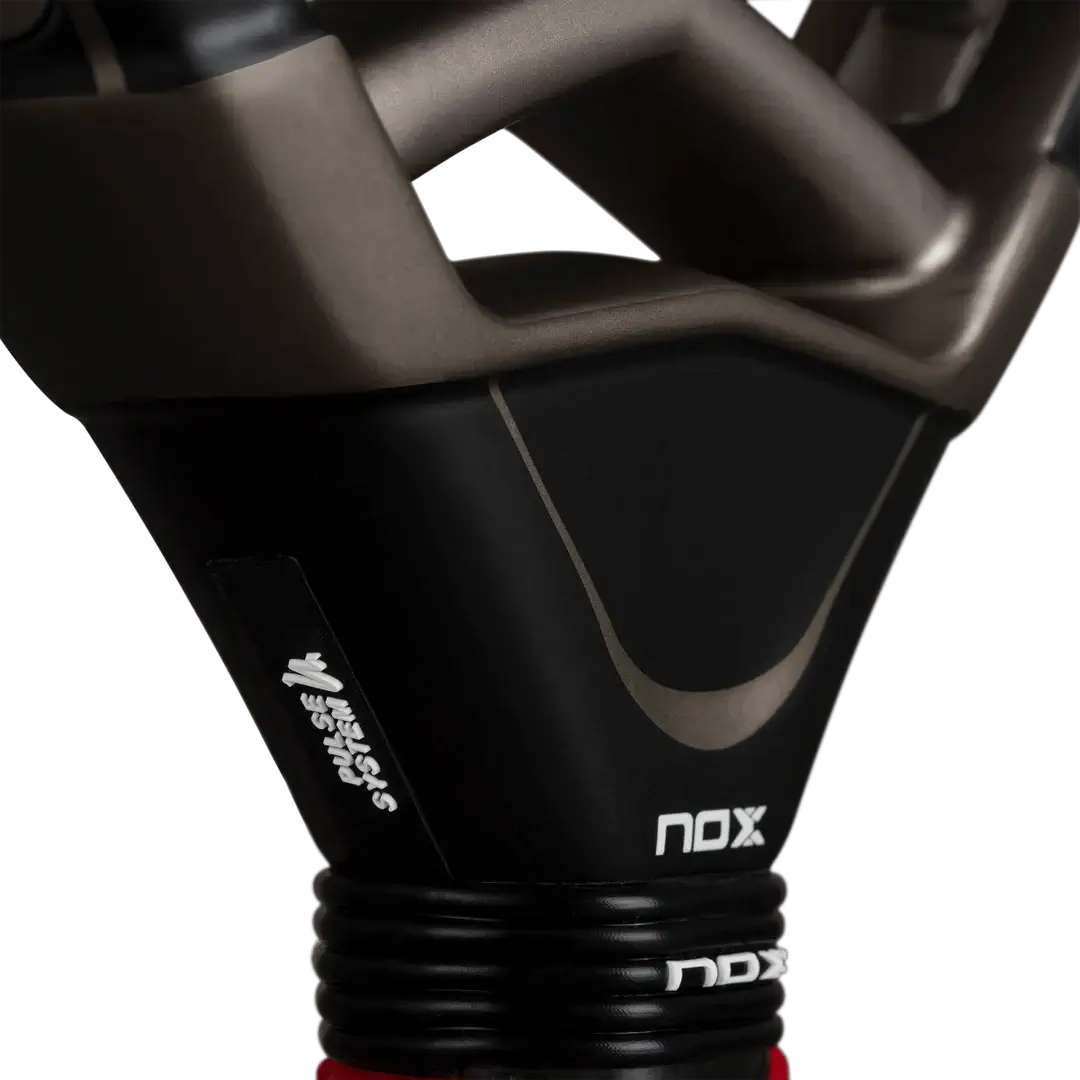 NOX AT10 PRO CUP HARD BY AGUSTÍN TAPIA racket handle showcasing innovative design features.