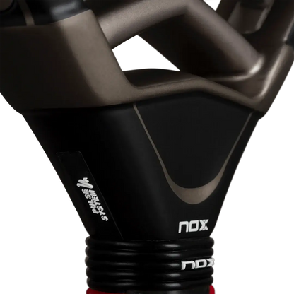 NOX AT10 PRO CUP HARD BY AGUSTÍN TAPIA racket handle showcasing innovative design features.