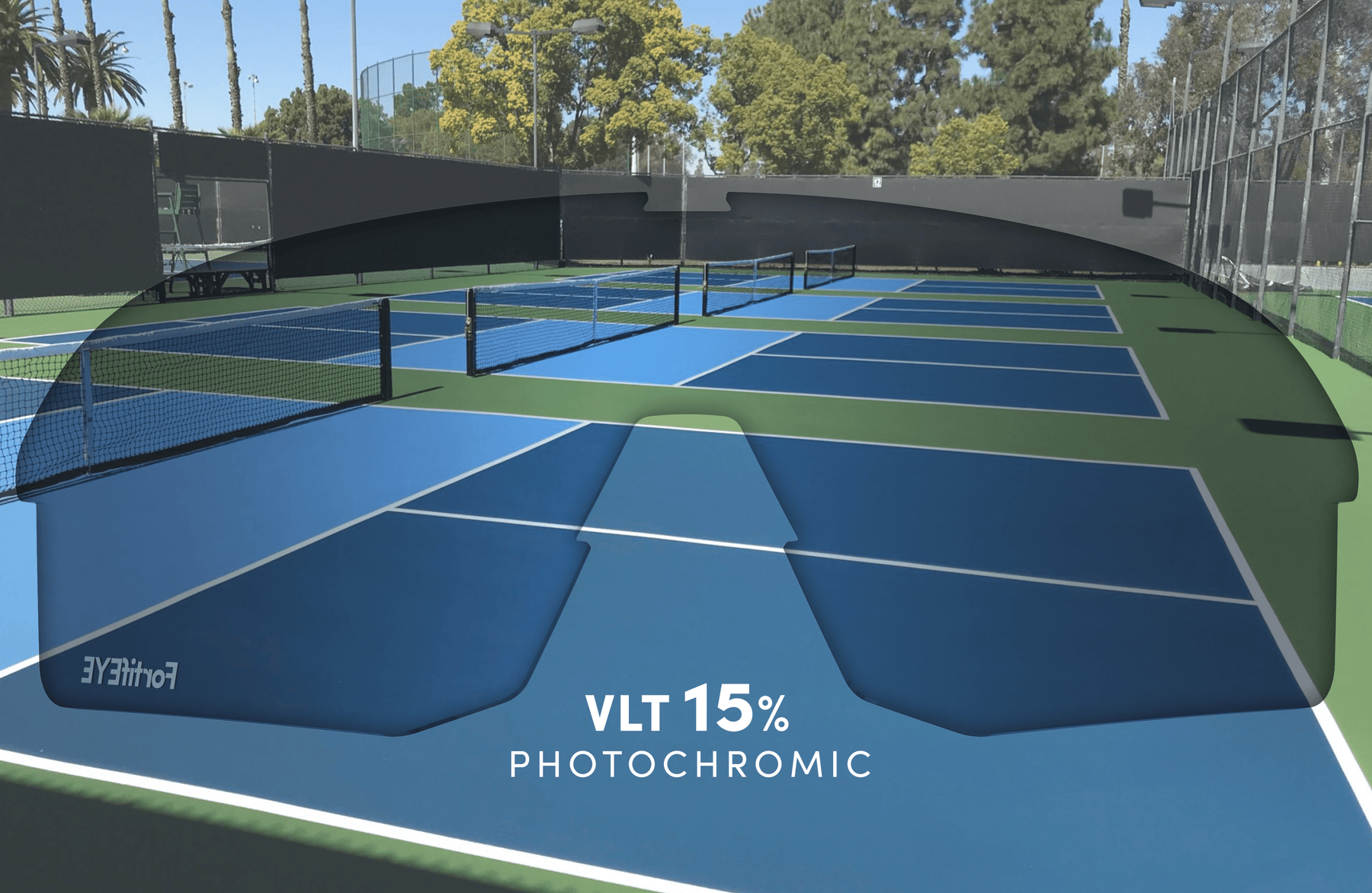 CRBN Pivot Replacement Lenses showing VLT 15% with a pickleball court in the background for outdoor protection.