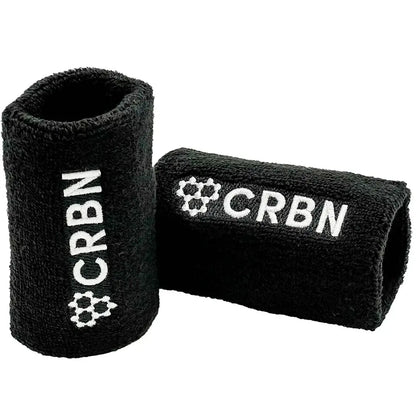 CRBN wristband set in black, featuring embroidered design, soft terry loop material, ideal for sports or style.