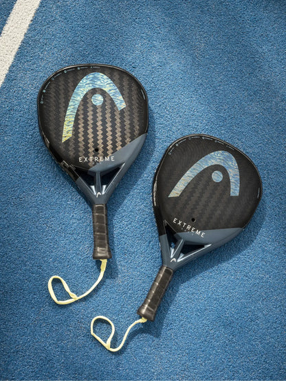 HEAD Extreme One Padel Racquet on a blue court surface showcasing its lightweight design and advanced technology.