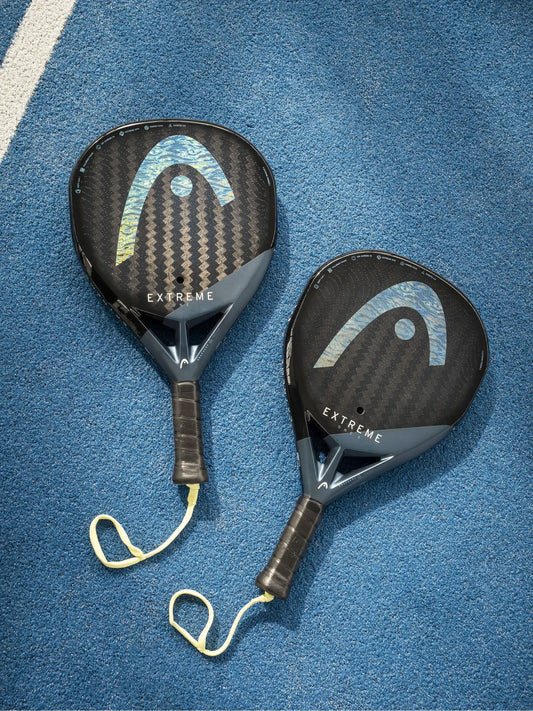 HEAD Extreme One Padel Racquet on a blue court surface showcasing its lightweight design and advanced technology.