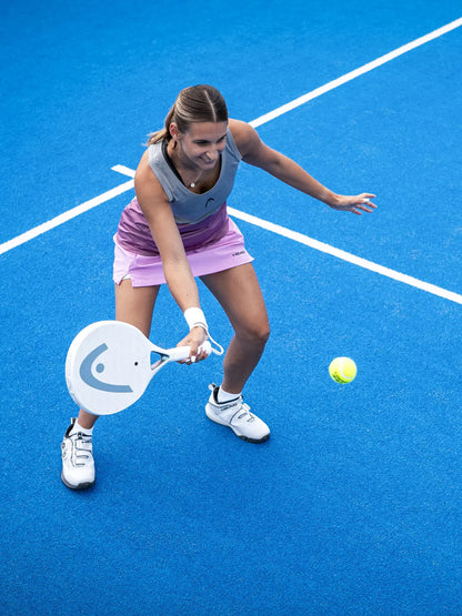 HEAD One Ultralight Padel Racquet in action on blue court with female player.