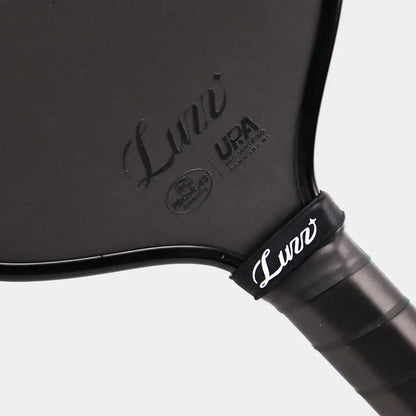 Luzz Cannon2 M1 Paddle showcasing the sleek design and UPA certification marking for competitive play.
