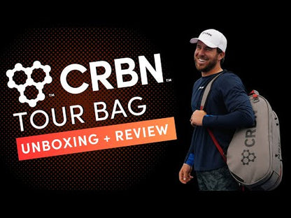 CRBN Tour Bag 2.0 in Pearl color, showcased by a man during unboxing and review.
