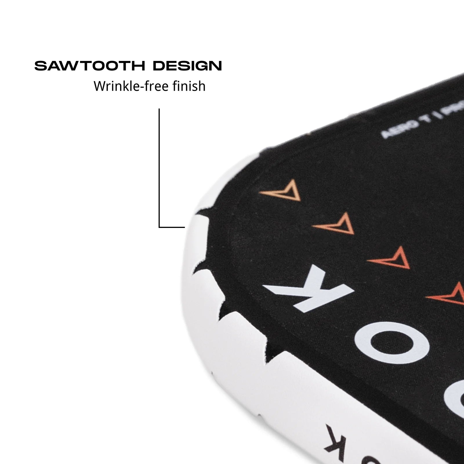 Close-up of Holbrook protective edge tape showing sawtooth design and wrinkle-free finish for pickleball paddle.