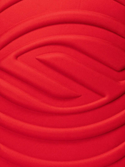 Close-up of the textured red fabric on the Selkirk LABS Prestige Pickleball Backpack.