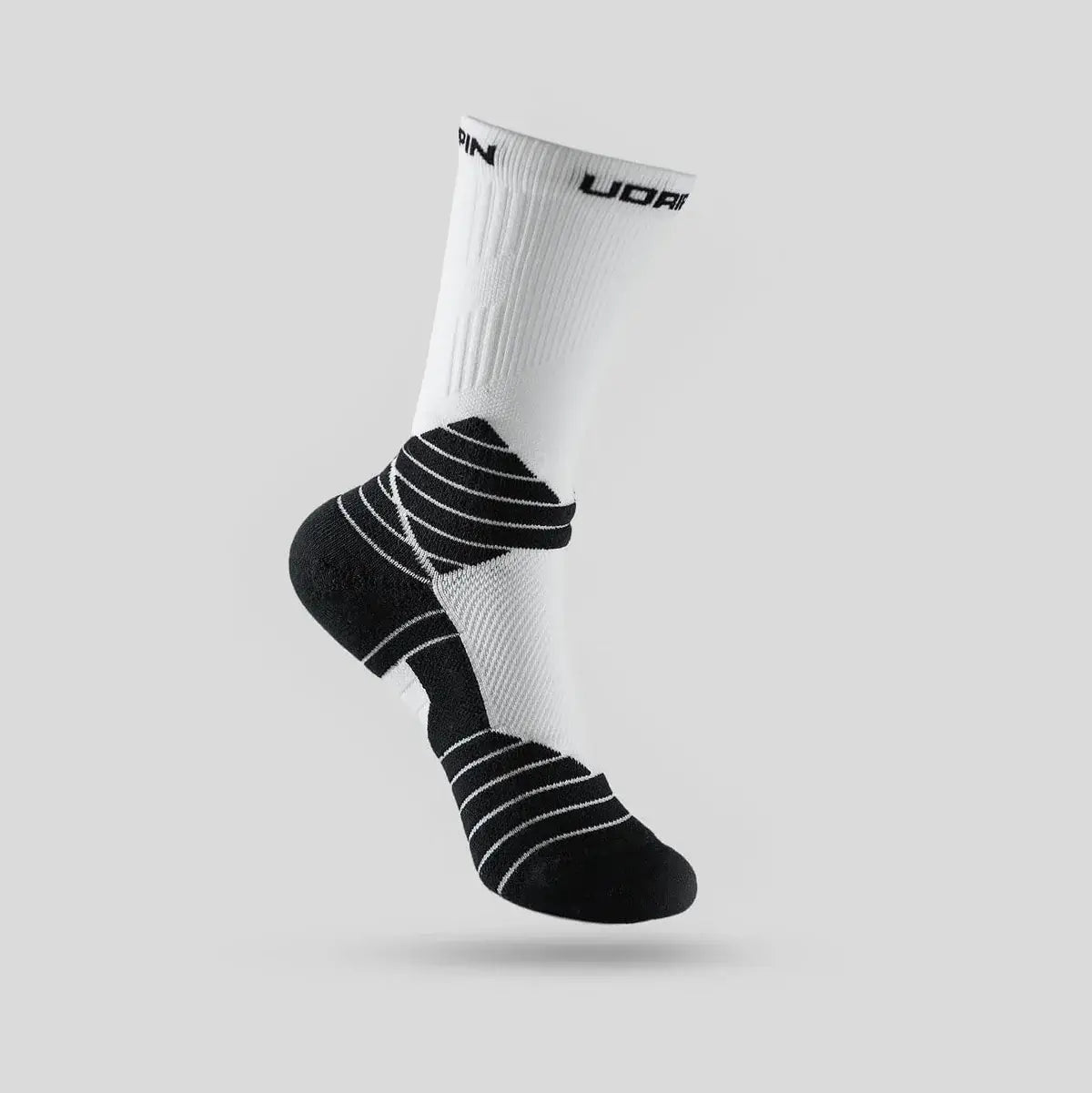 Udrippin CMFRTDrip Socks - White showcasing a lightweight, breathable design for optimal comfort during activities.