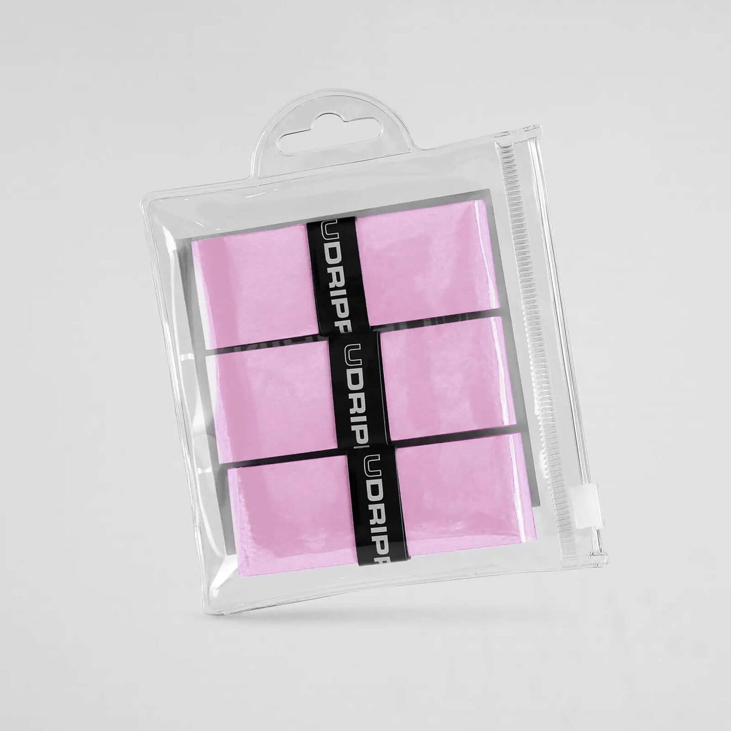 Udrippin Soft Pink -  Pro Tour grips in a clear packaging, designed for superior tackiness and sweat absorption.