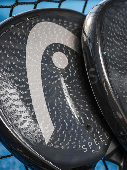HEAD Speed One Padel Racquet close-up showing the unique design and texture of the hitting surface.