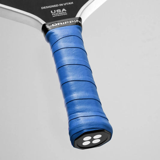 UDRIPPIN Pro Tour Grip with blue wrap on paddle handle providing extra tackiness, sweat absorbent material, and increased feel