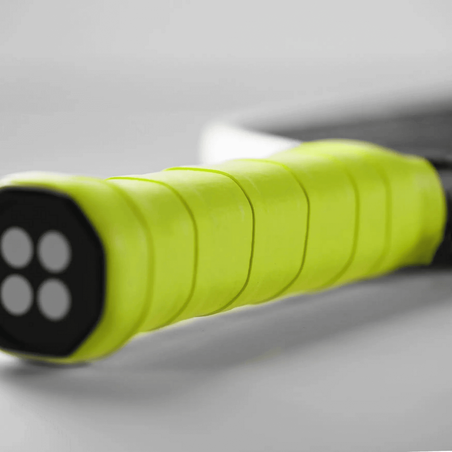 Udrippin Neon Green - Pro Tour paddle grip showcasing high quality tackiness and sweat absorbent features.