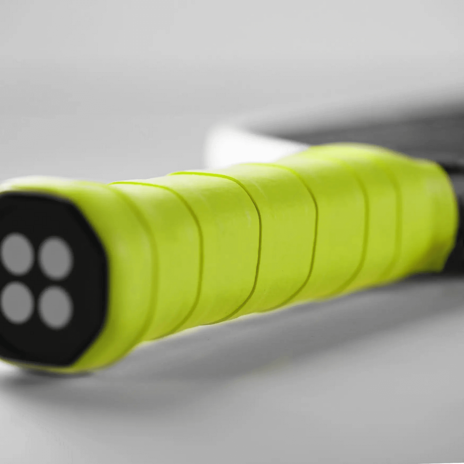 Udrippin Neon Green - Pro Tour paddle grip showcasing high quality tackiness and sweat absorbent features.