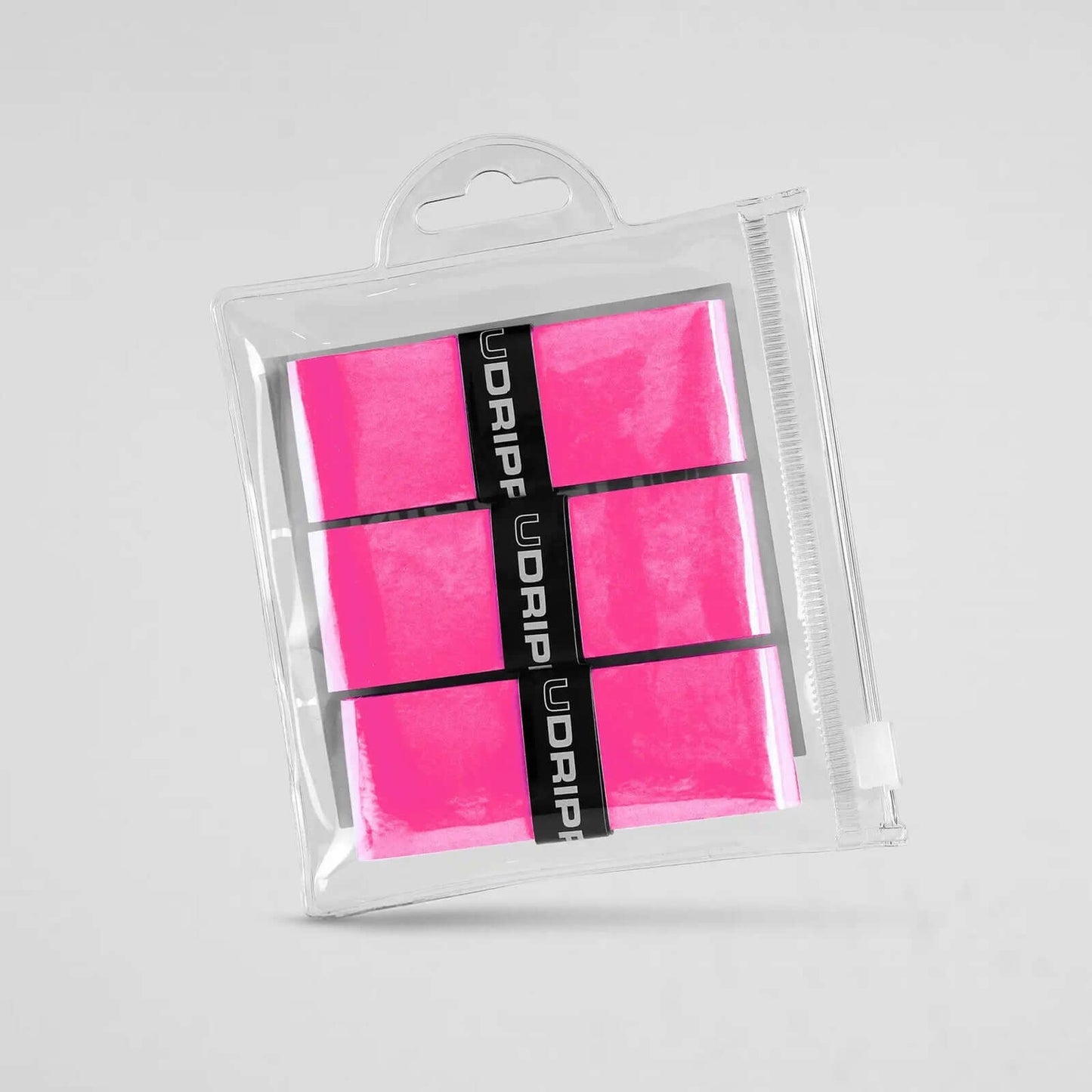 Udrippin Neon Pink - Comfort Tour paddle grip pack showing high quality sweat absorbent grips in a clear package.