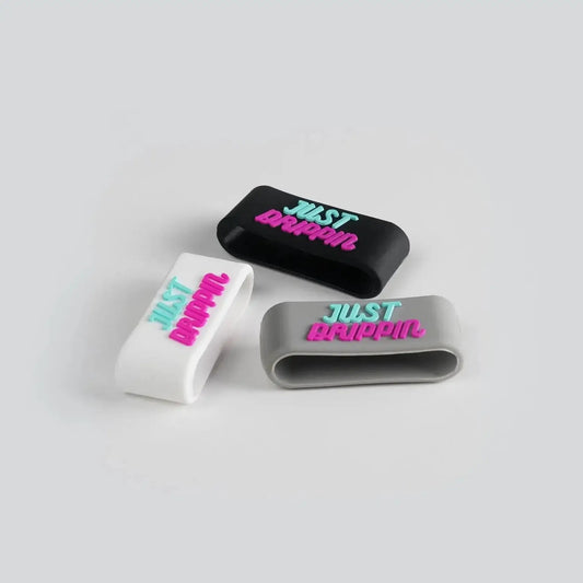 JUST DRIPPIN Paddle Silicone Rings in black, white, and grey. Essential accessory for better paddle grip.