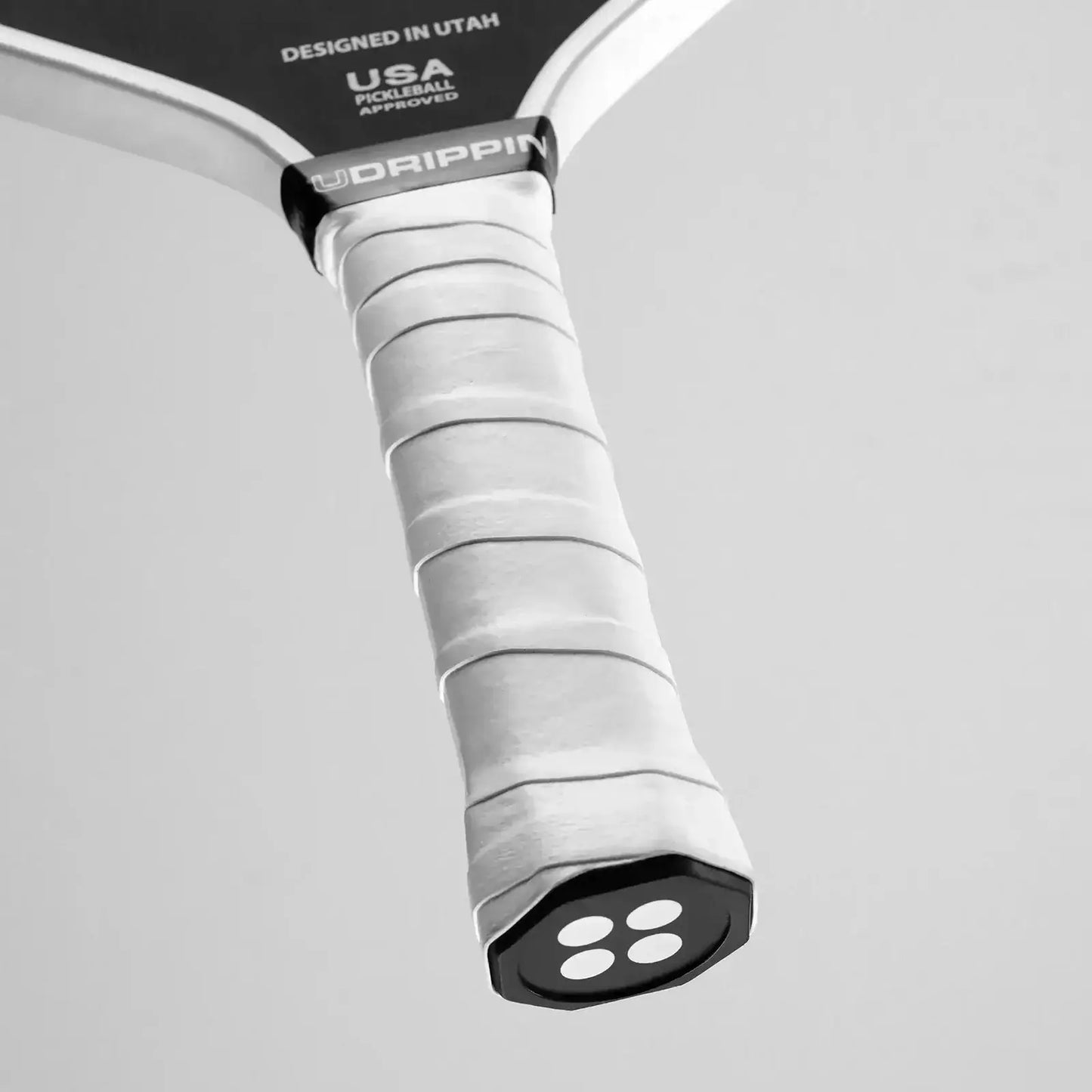 Udrippin White - Pro Tour paddle grip showcasing high quality, sweat absorbent material for enhanced tackiness.