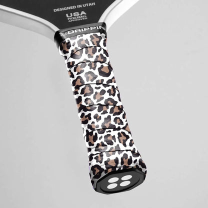Udrippin White Leopard Print - Custom Grips on a pickleball racket for style and secure grip.